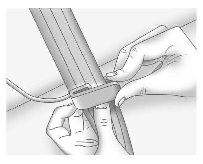 3. Place the guide over the belt, and insert the two edges of the belt into the slots of the guide.