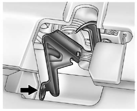 2. Go to the front of the vehicle and with hand palm side down, slide the secondary