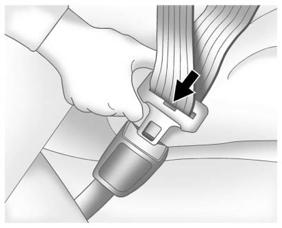 3. Push the latch plate into the buckle until it clicks