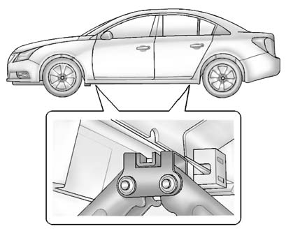 7. Position the jack lift head at the jack location nearest the flat tire. The