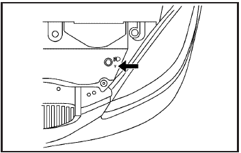 7. Locate the vertical headlamp aiming screws, which