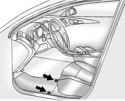 Reinstall by lining up the floor mat retainer openings over the carpet retainers